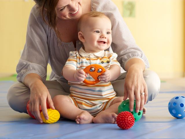 infant-playing-with-mom1